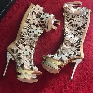 Crystal lace up platform stiletto boot.